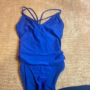Blue, Woman’s one piece swimsuit medium, brand Hurley.